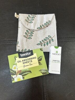 Bundle ft. NIB Nexxt Purifying Tea Tree Serum, oil blotting sheets and small bag